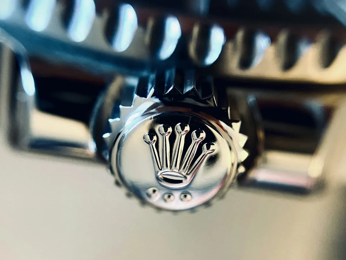 About Rolex Malaysian's photography: a macro photo of a Rolex Triplock winding crown