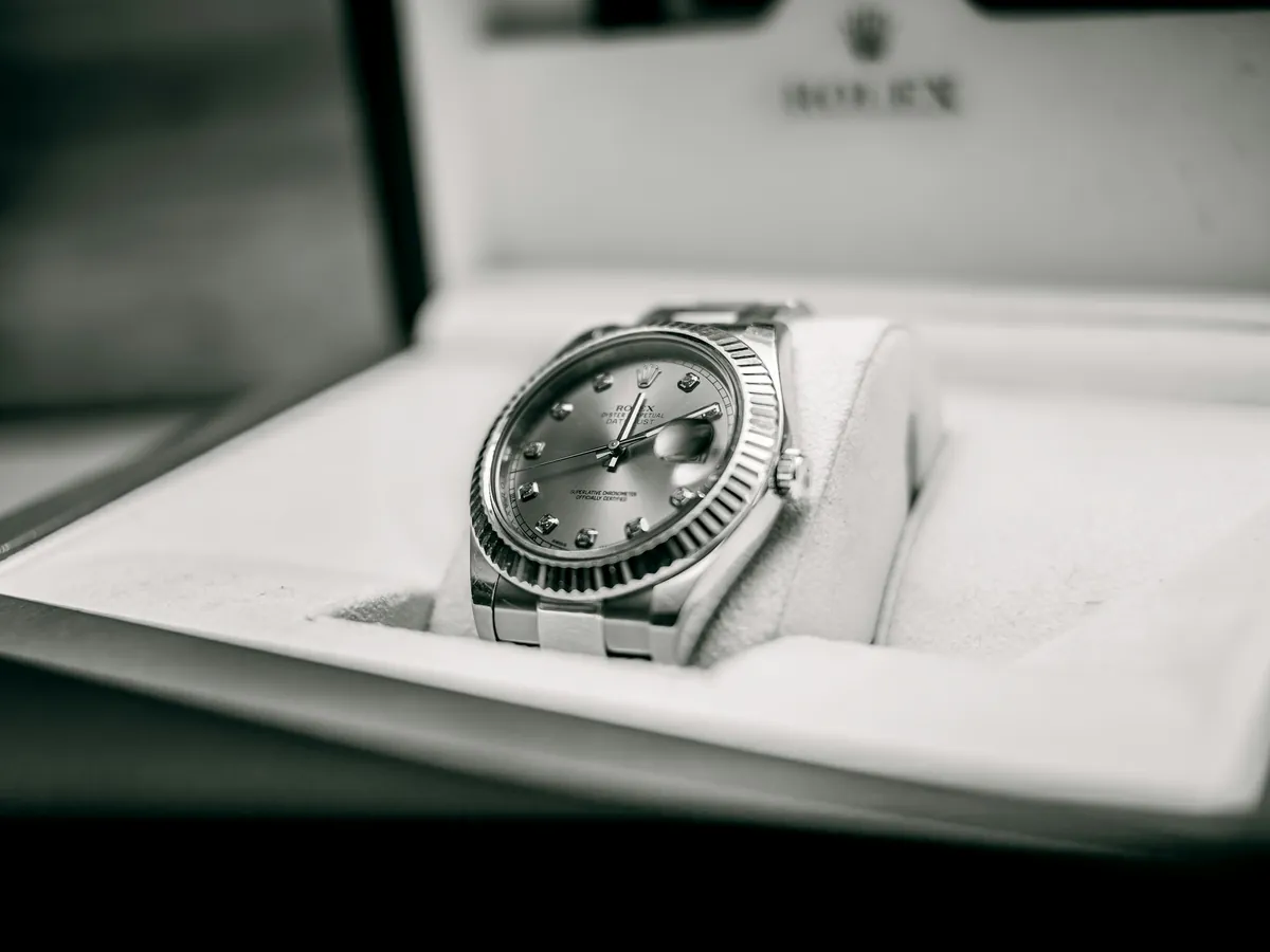 Rolex buying guide: a fluted-bezel Datejust resting in its presentation box
